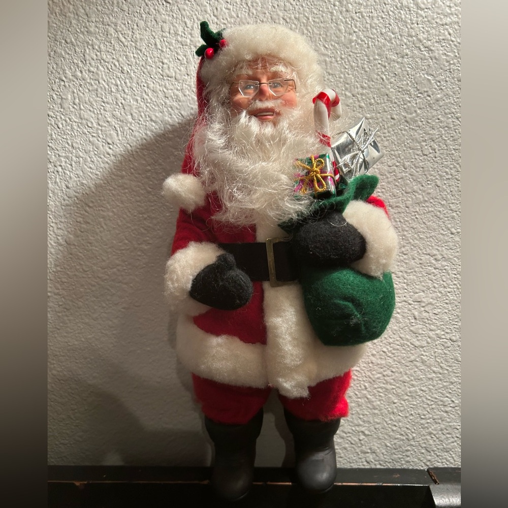 Vintage 1990s Poseable standing Santa. Felted clothes and very sturdy/solid.